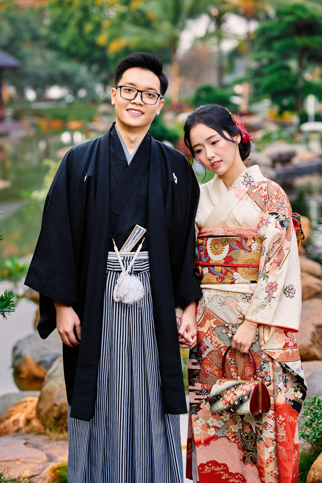 Portrait of a young Japanese man smiling in a casual shirt