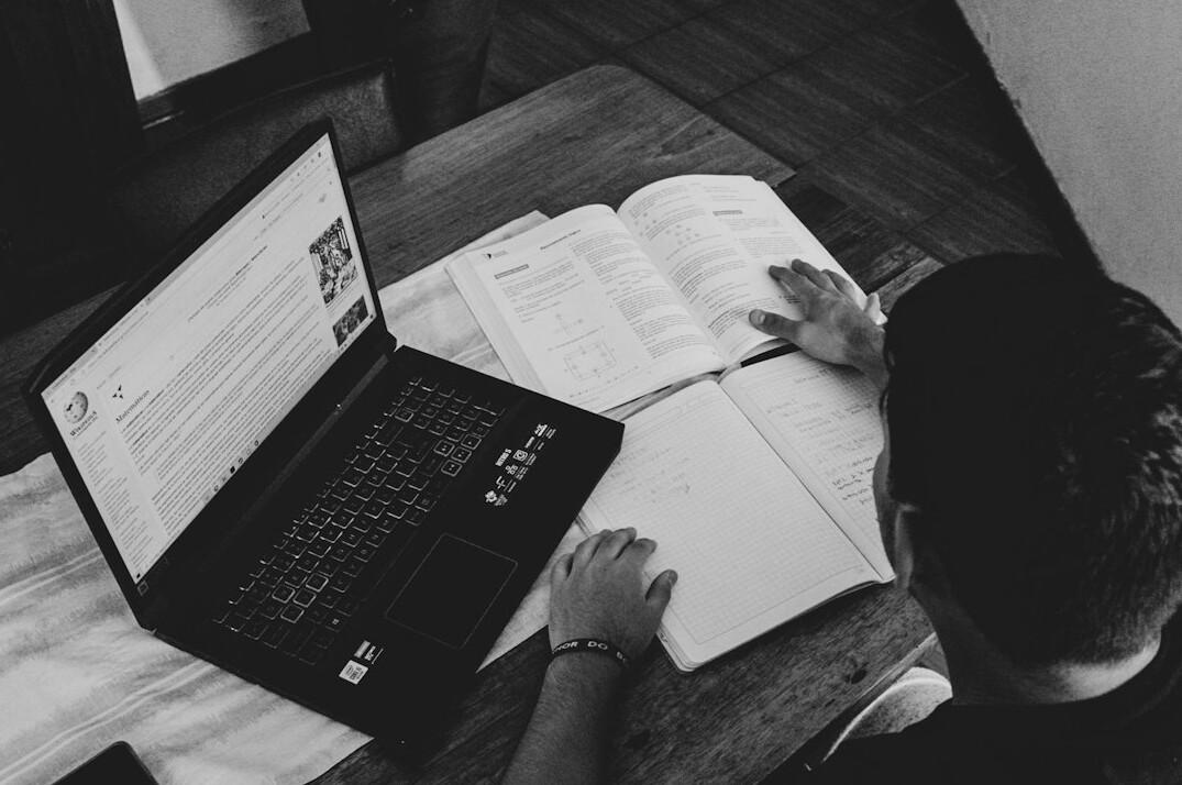 person studying japanese and code