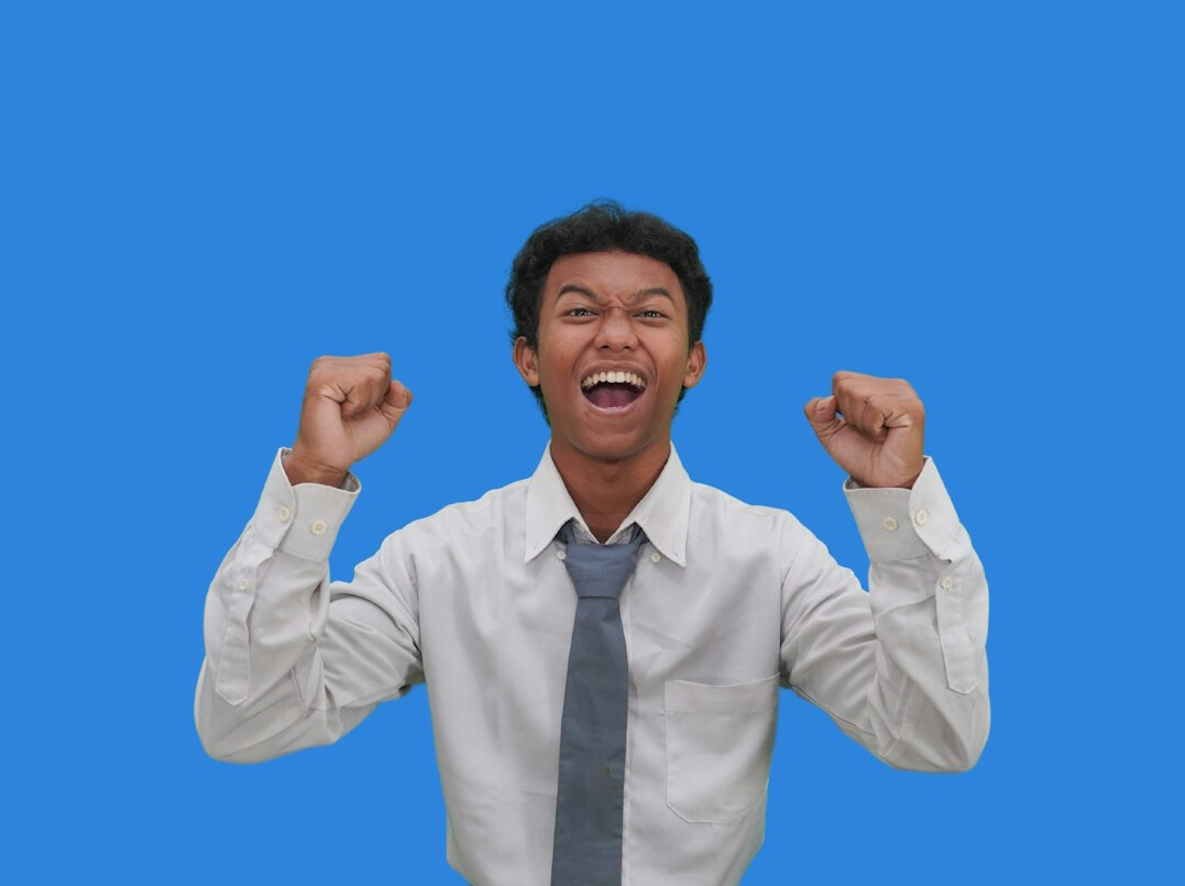 happy student celebrating coding success